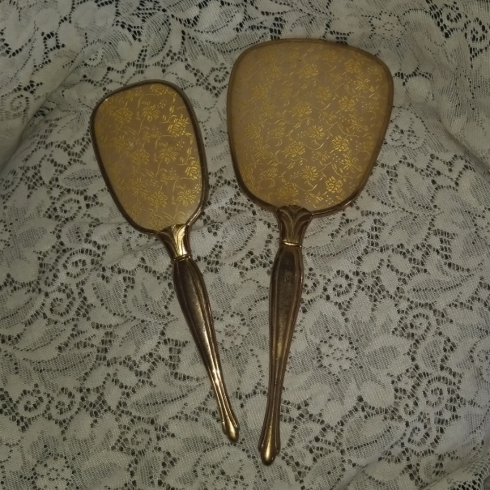 Vintage hand mirror and brush set